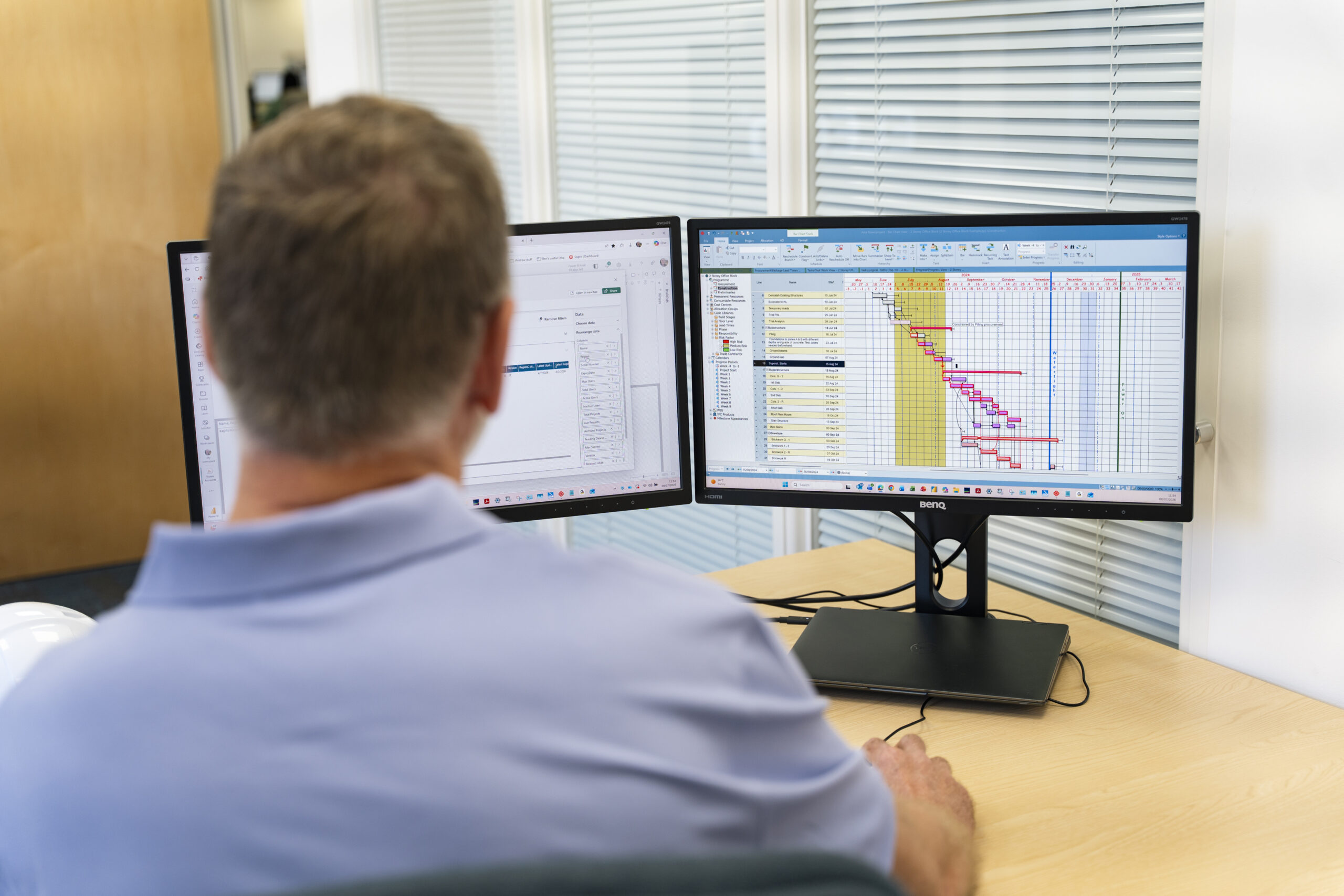 Man looking at a schedule in Asta Powerproject